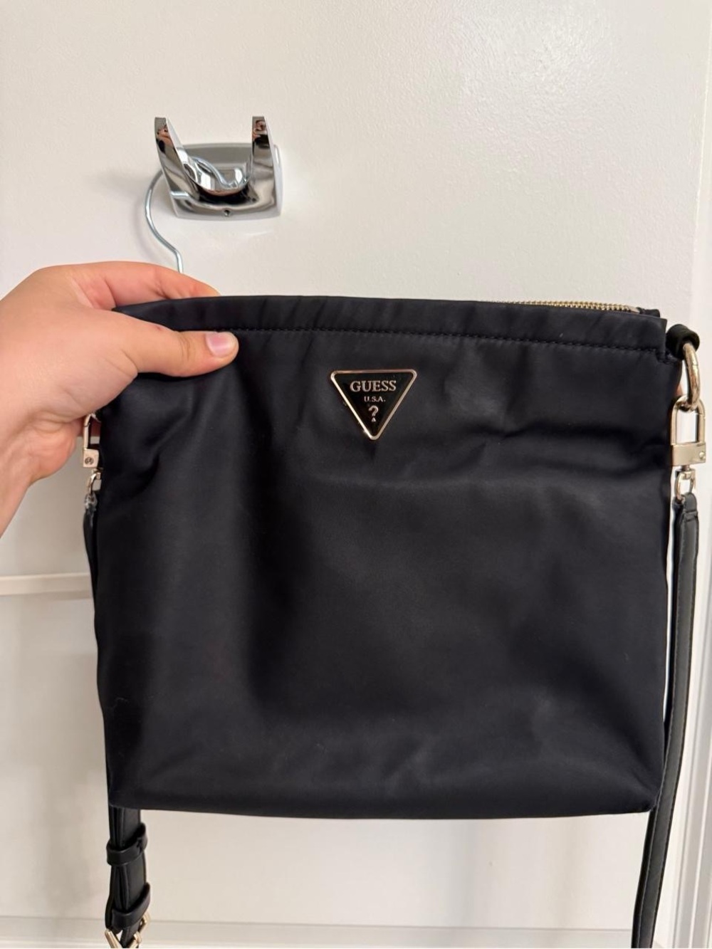 GUESS Black Crossbody Bag with Gold Triangle Logo